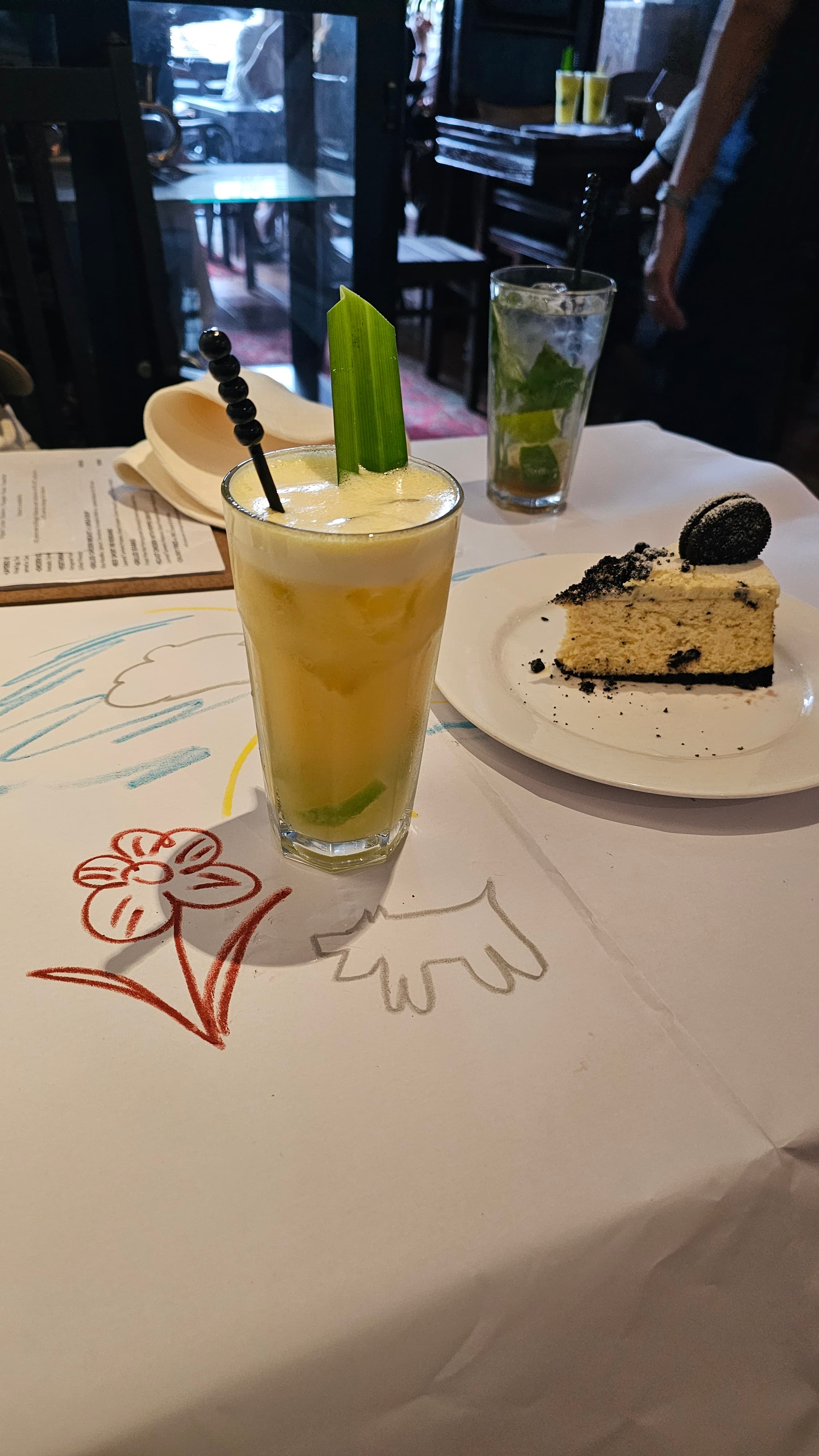 Slice of cake and coffee at China House on Beach Street, George Town