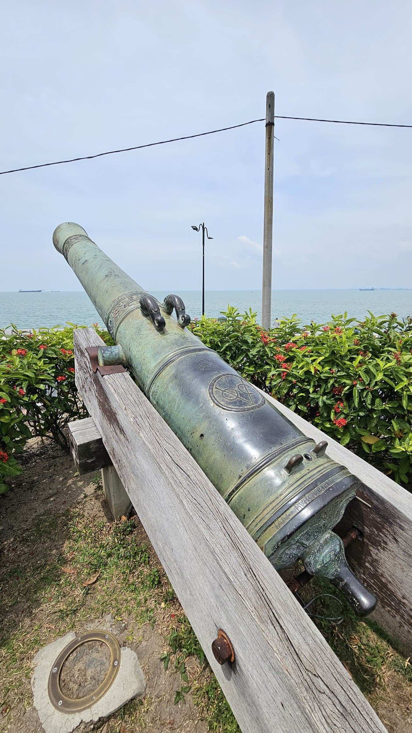 A historic cannon overlooking the sea at Fort Cornwallis in George Town, Penang
