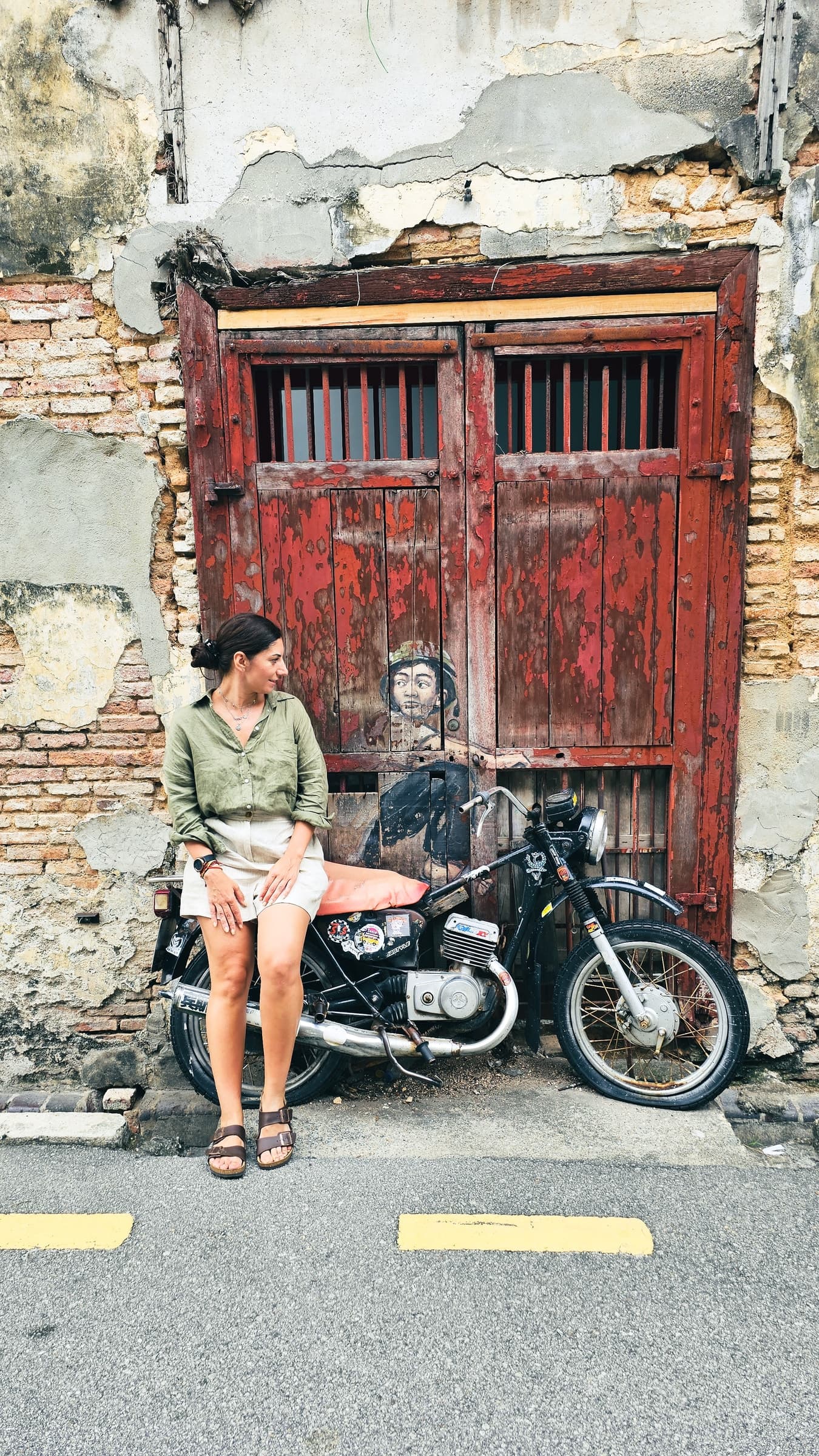 One of George Town's famous painted murals on a heritage shophouse wall
